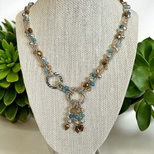 NEW Handmade Crystal and seed bead necklace. Tasseled silver toned accents